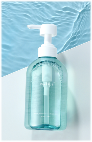 Amino Acid Shampoo with Sea Salt in a 500ml bottle, featuring a sleek design and vibrant label, surrounded by sea salt and fresh ingredients.