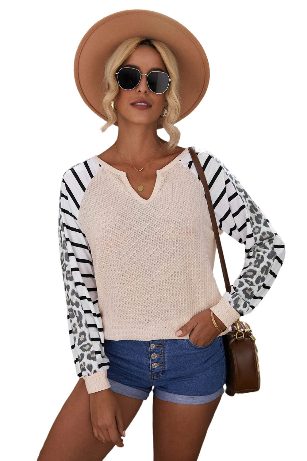 Animal Striped Sleeve Patchwork Waffle Knit Top featuring v-neckline, color block sleeves with stripes and leopard print.