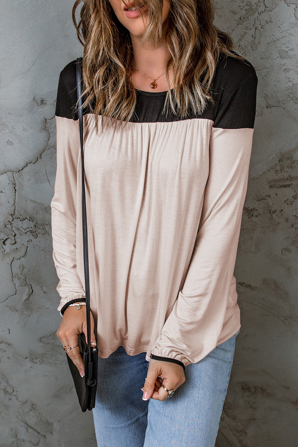 Apricot Round Neck Long Sleeve Color Block Tunic Top featuring black and apricot color blocks, elastic cuffs, and a relaxed silhouette.