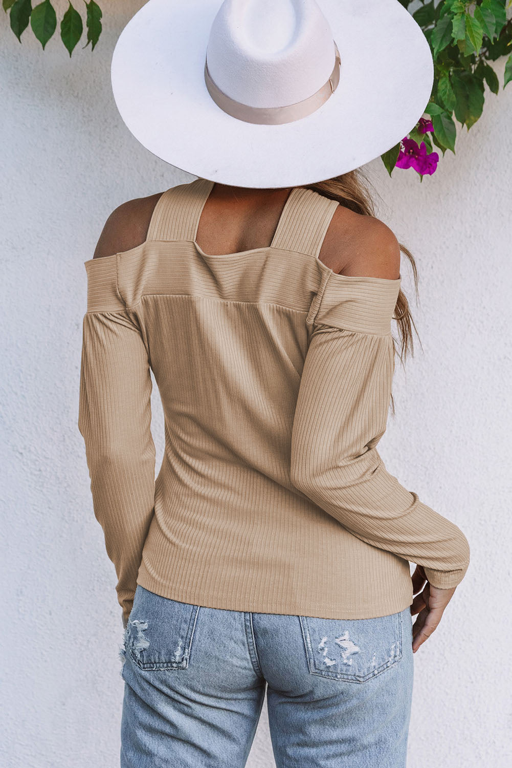 Apricot Cut Out Criss Cross Cold Shoulder Ribbed Top showcasing stylish design and ribbed texture.