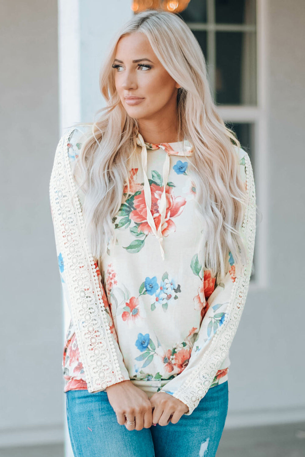 Apricot floral print hoodie with lace contrast, featuring long sleeves and a stylish design, perfect for casual wear.