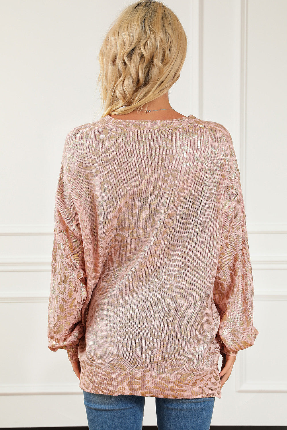 Apricot Glitter Leopard Print Puff Sleeve Sweater showcasing stylish design with puff sleeves and leopard print pattern.