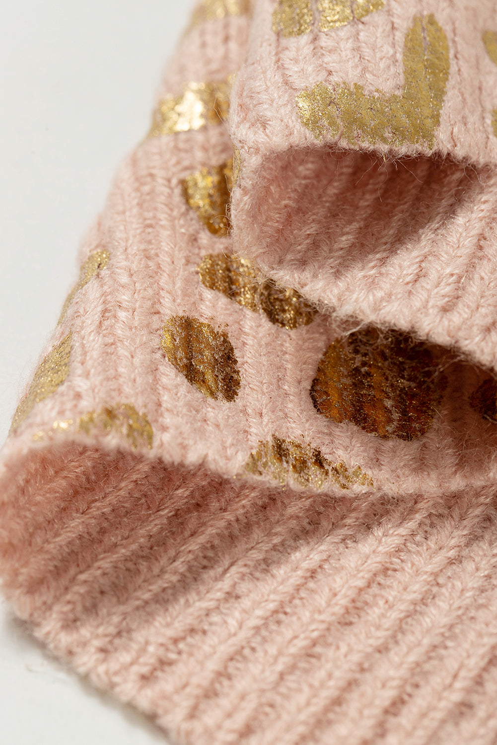 Apricot Glitter Leopard Print Puff Sleeve Sweater showcasing stylish design with puff sleeves and leopard print pattern.