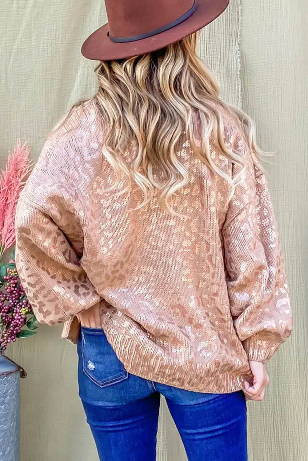 Apricot Glitter Leopard Print Puff Sleeve Sweater showcasing stylish design with puff sleeves and leopard print pattern.