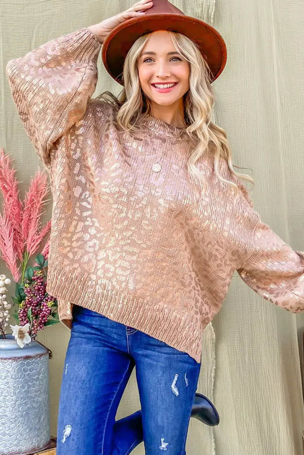 Apricot Glitter Leopard Print Puff Sleeve Sweater showcasing stylish design with puff sleeves and leopard print pattern.