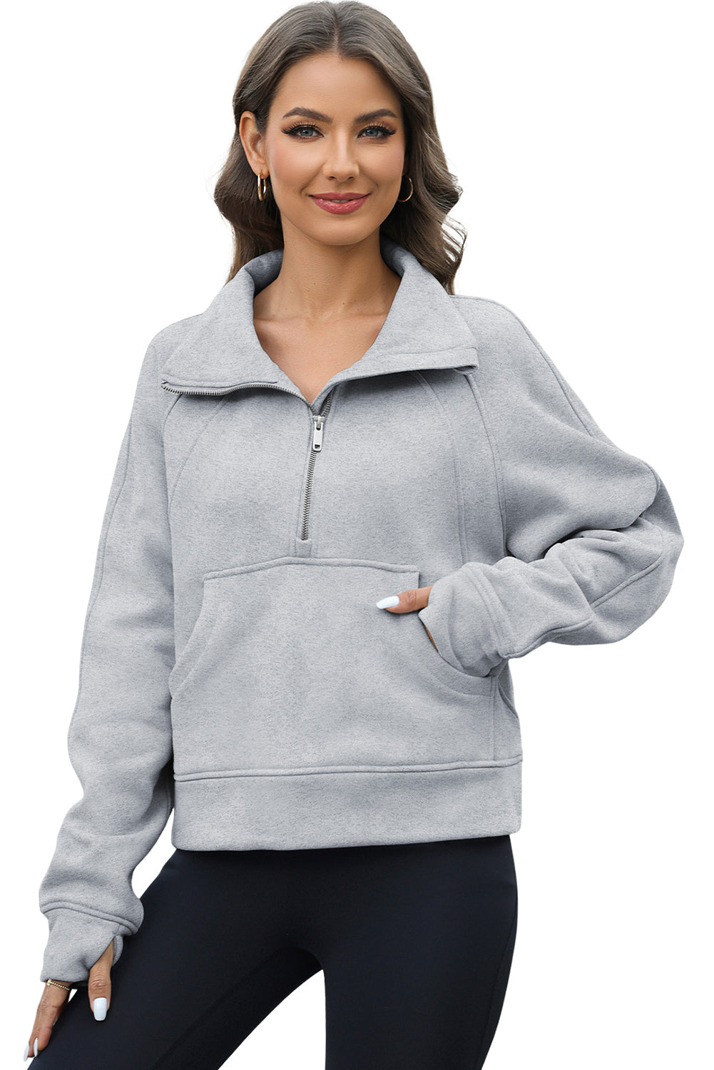 Apricot half zipper kangaroo pocket sweatshirt with thumb holes, showcasing a stylish and active design.