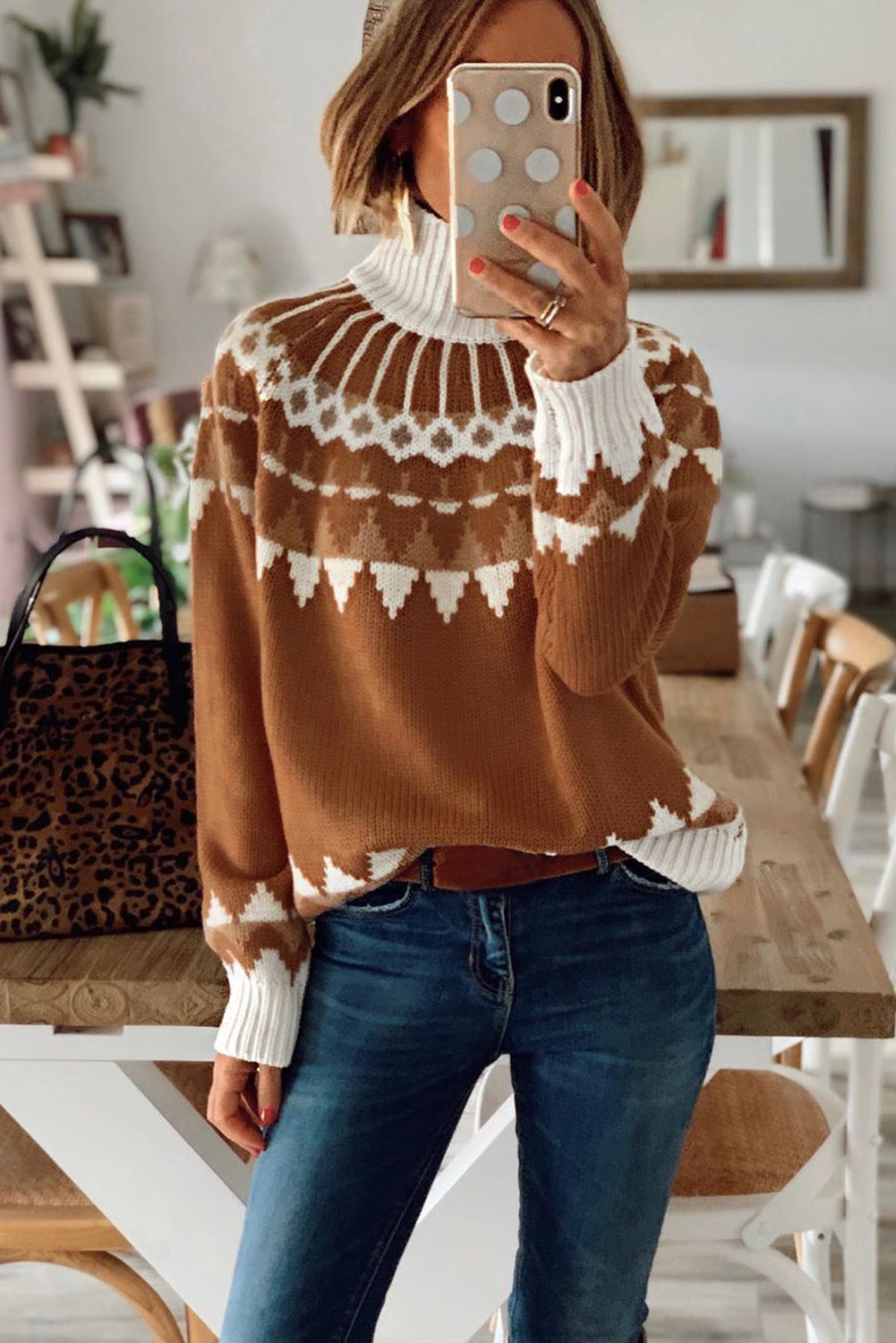 Apricot high neck printed knit sweater with ribbed cuffs and hemline, showcasing a chic pattern perfect for winter wear.