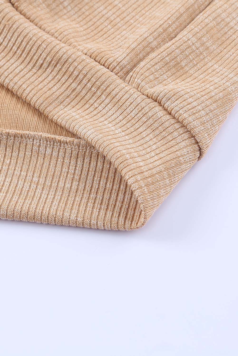 Apricot ribbed cardigan with buttons and V-neck design, perfect for layering and stylish outfits.