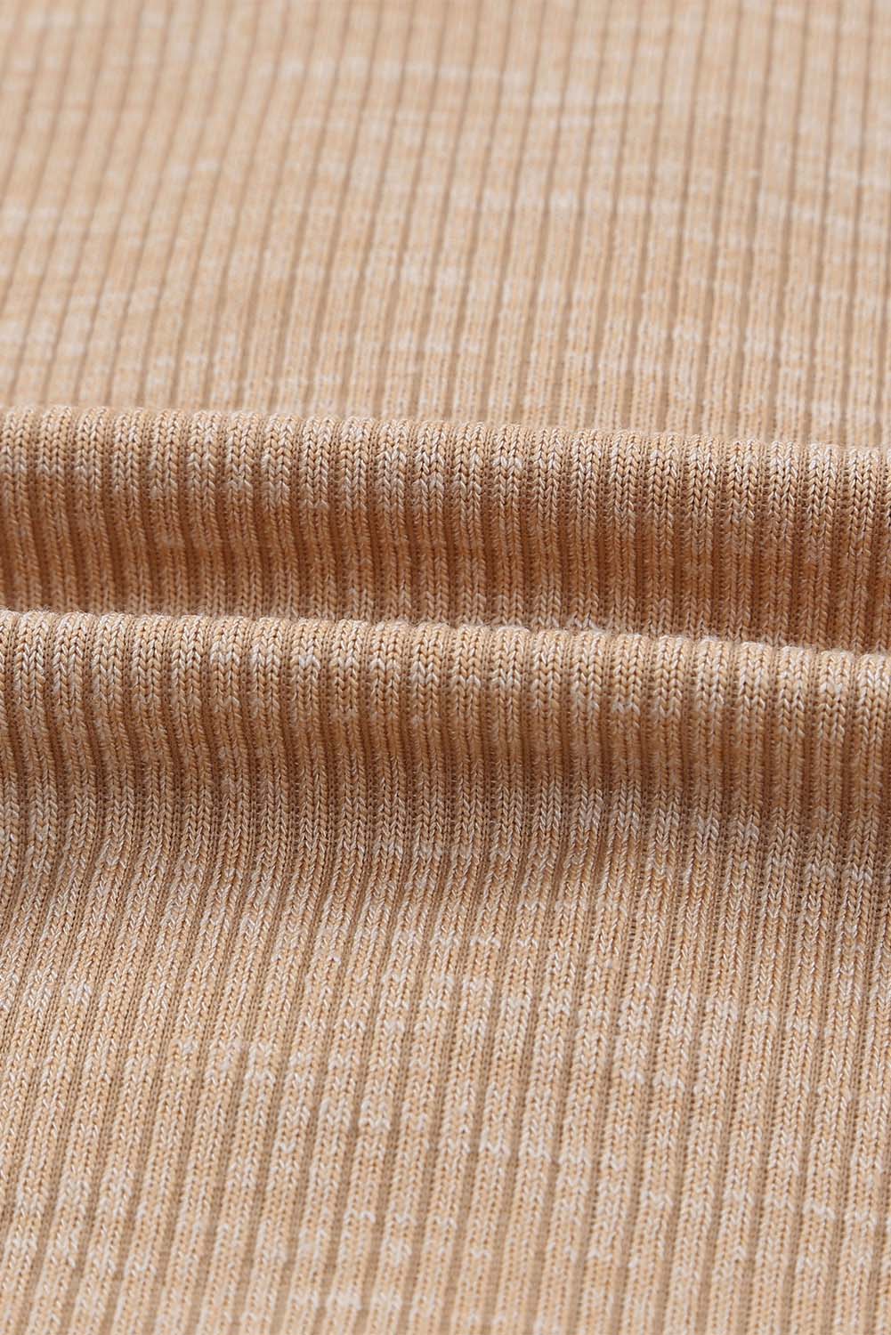 Apricot ribbed cardigan with buttons and V-neck design, perfect for layering and stylish outfits.