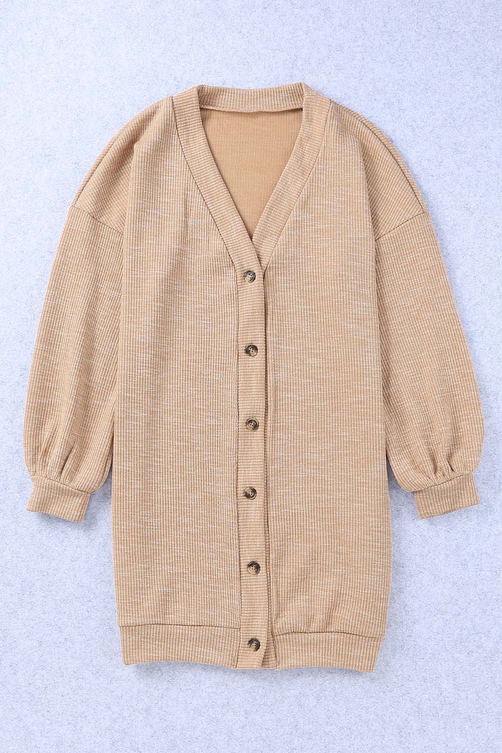 Apricot ribbed cardigan with buttons and V-neck design, perfect for layering and stylish outfits.