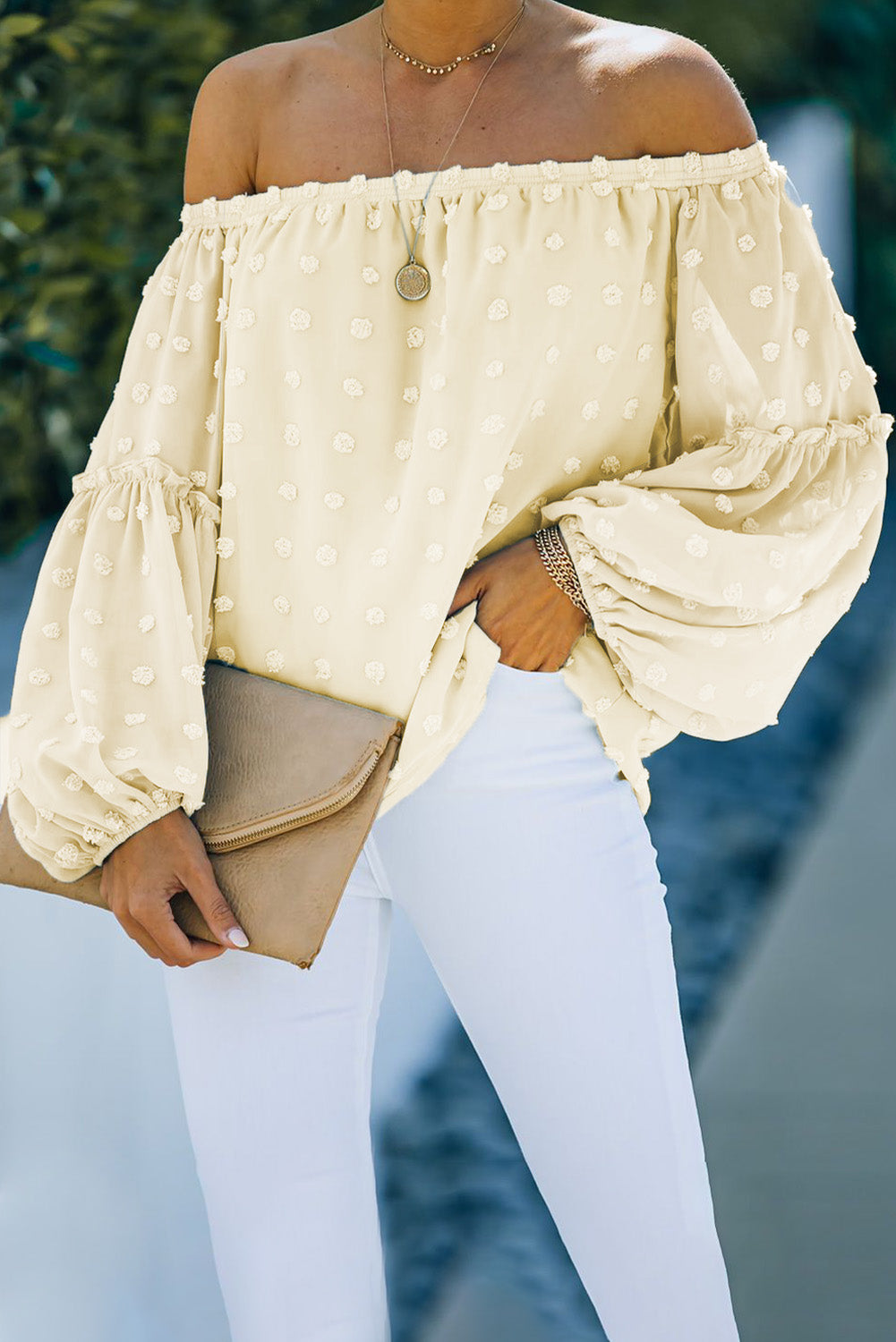 Apricot Swiss Dot Off The Shoulder Blouse featuring delicate fabric and stylish design.