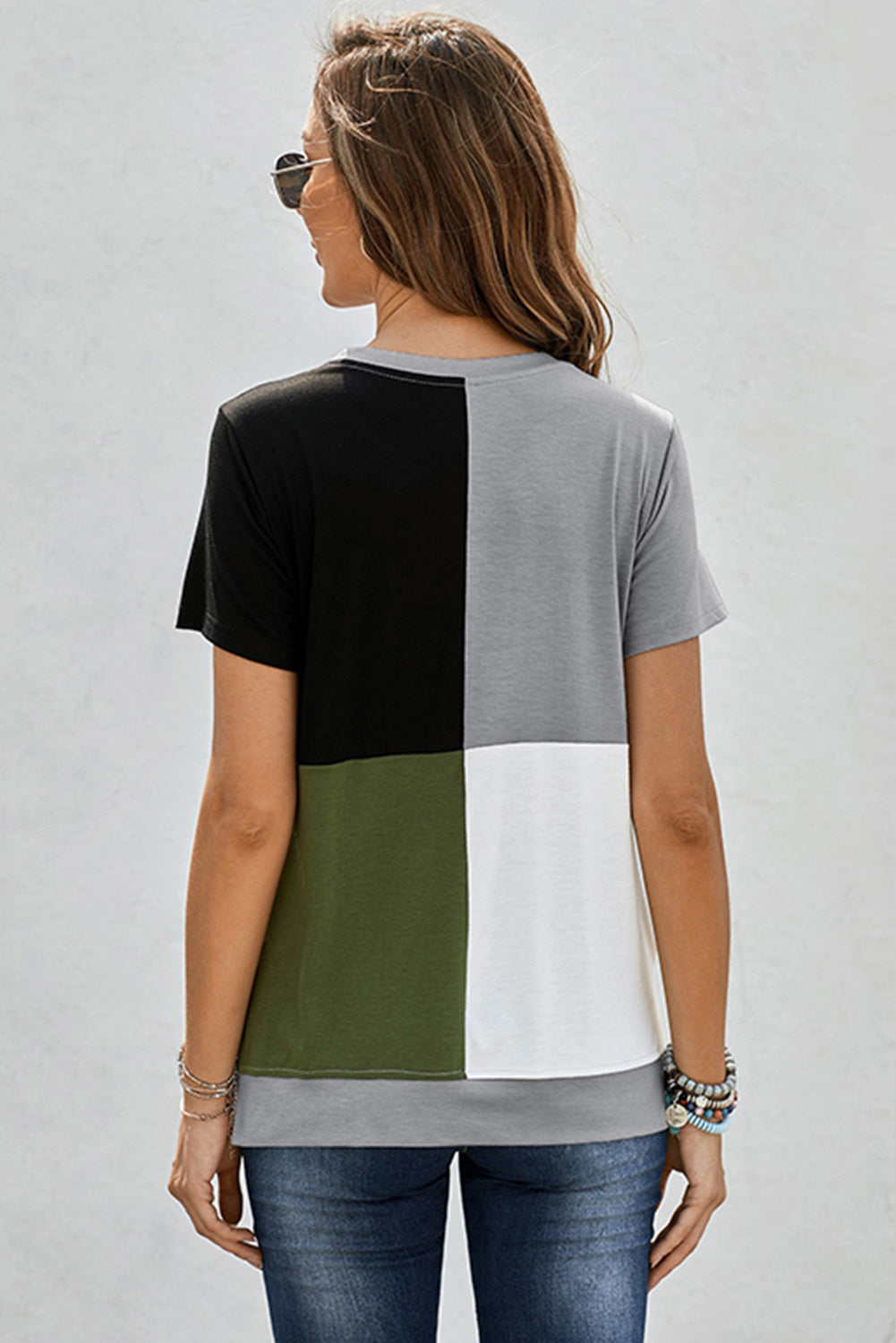 Army Green Colorblock T-shirt featuring stylish side slits and a relaxed fit, perfect for casual wear.