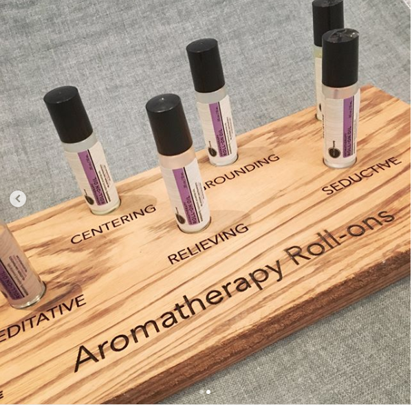 Aromatherapy Roll-On Oil in a frosted glass vial with a roll-on applicator, showcasing its natural essential oil blends.