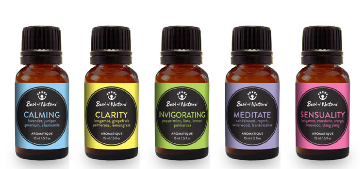 Aromatique Essential Oil Blend Gift Set featuring five 1/2 oz bottles of unique essential oil blends for relaxation and wellness.