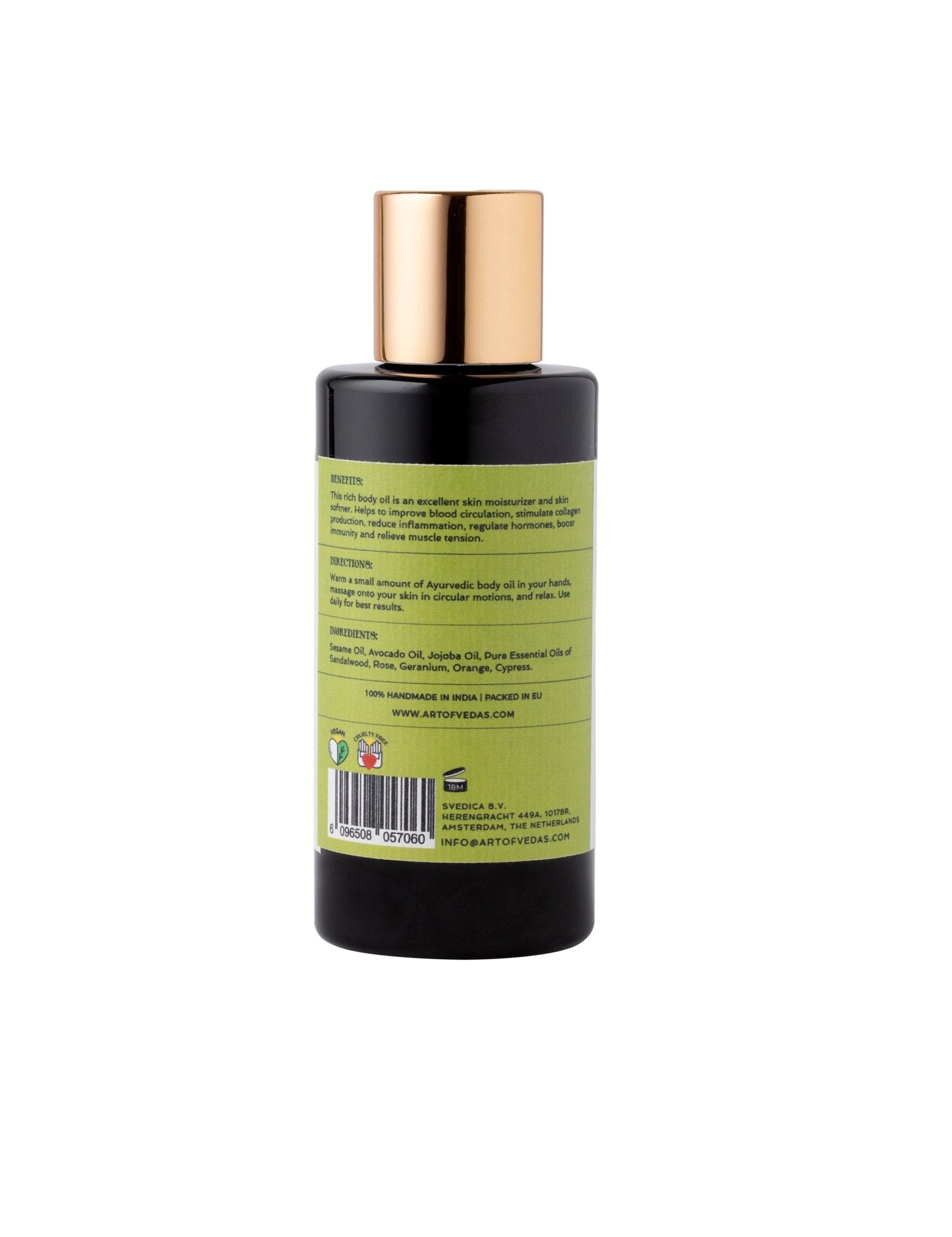 A bottle of Ayurvedic Body Oil featuring a blend of Sesame, Avocado, and Jojoba oils, surrounded by natural ingredients and herbs.