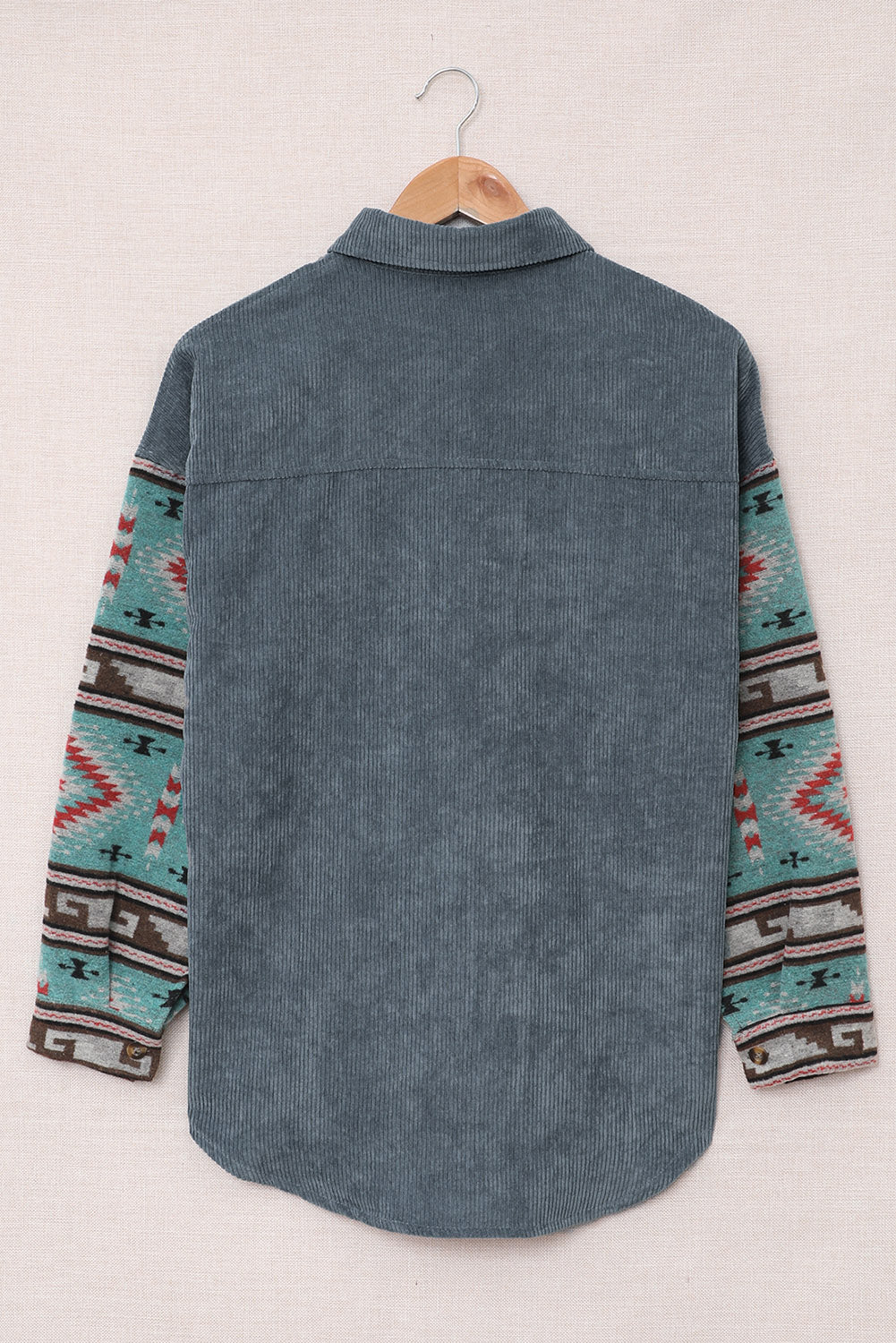 Aztec Pattern Sleeve Pocketed Corduroy Shacket featuring a stylish design with a collar, long sleeves, and a bust pocket.