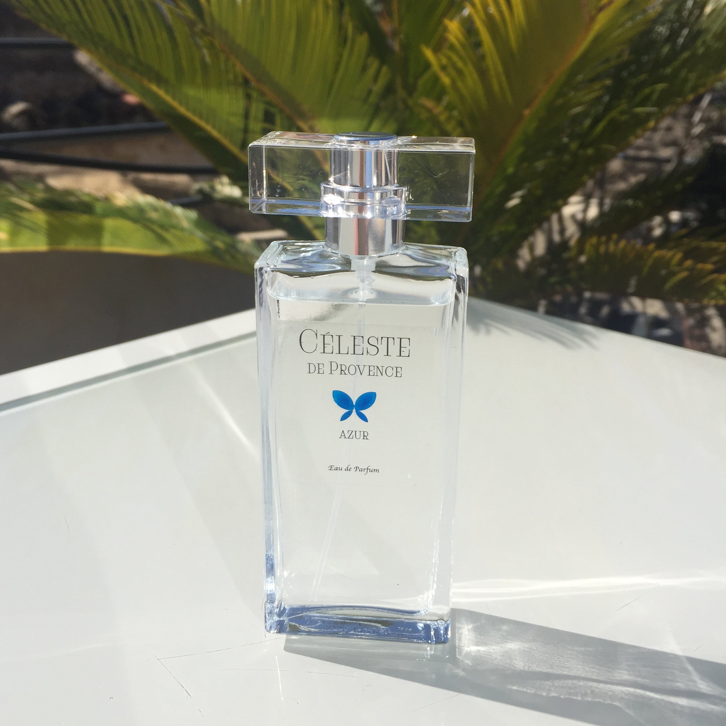 Azur 50ml Eau de Parfum bottle showcasing its elegant design, reflecting the essence of nature and freedom.