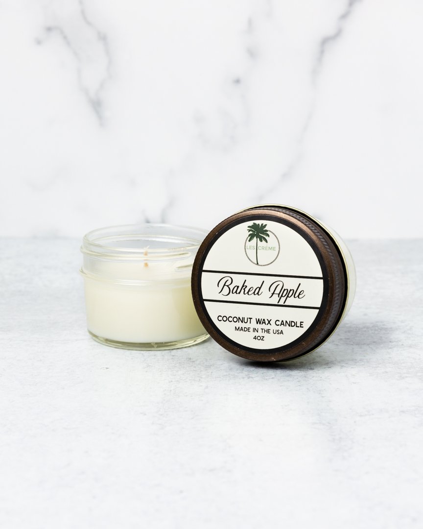 Baked Apple Scent Coconut Wax Candle in a glass jar, showcasing its warm, inviting color and natural ingredients.