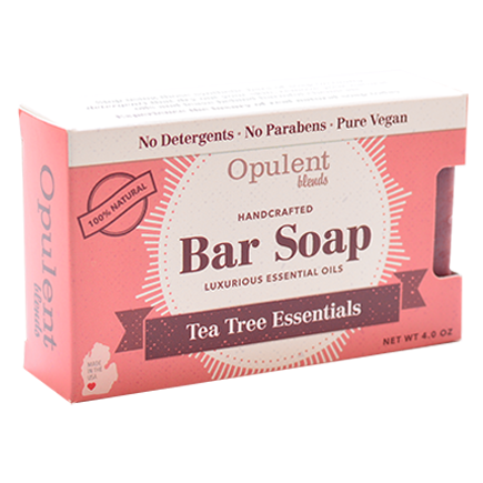 A bar of Tea Tree soap with natural ingredients, showcasing its earthy color and texture.