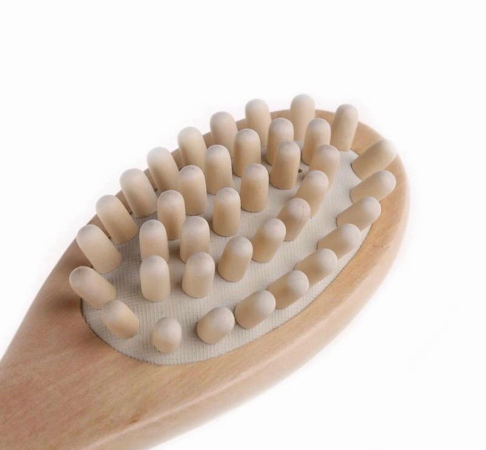 Eco-friendly Bath & Body Massage Brush with a long wooden handle and boar bristles, perfect for dry brushing and massages.