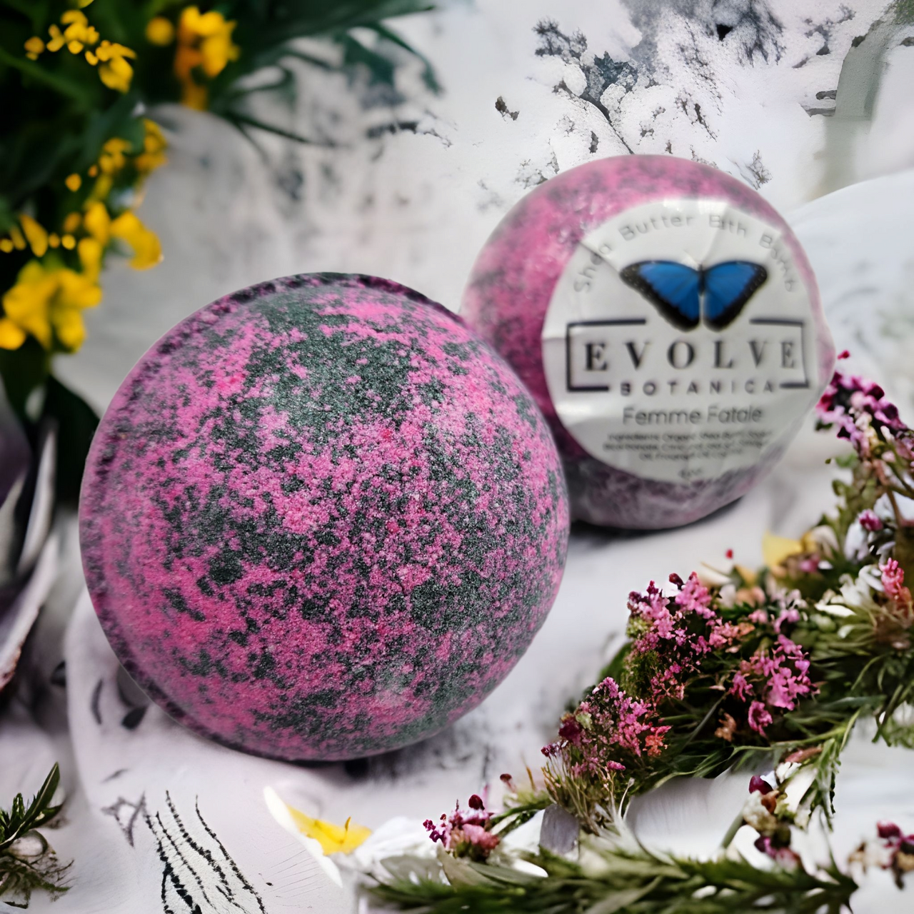 Femme Fatale Bath Bomb with floral and green blend, perfect for Valentine's Day relaxation.