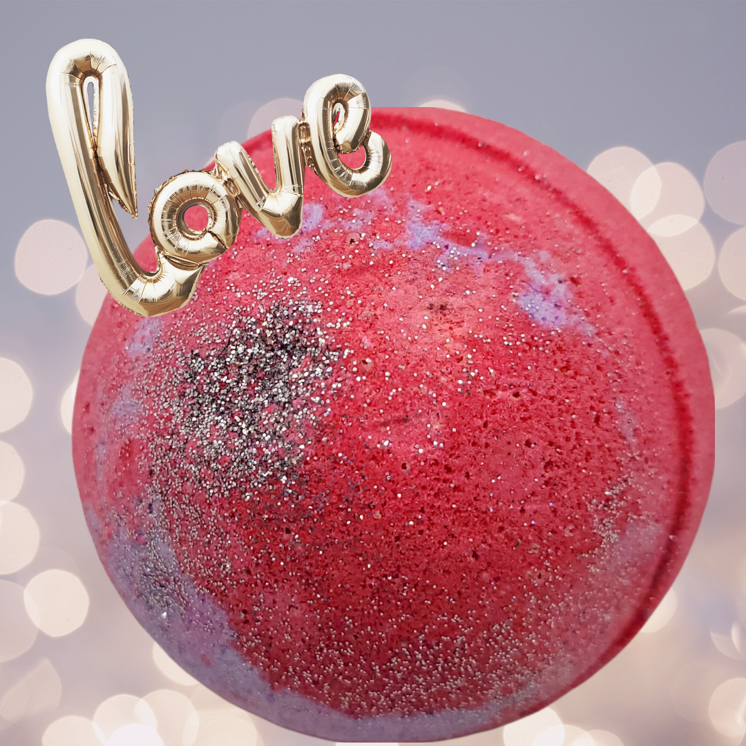 Love Shack Bath Bomb with cranberry and fig scent, featuring sparkling silver holo glitter.