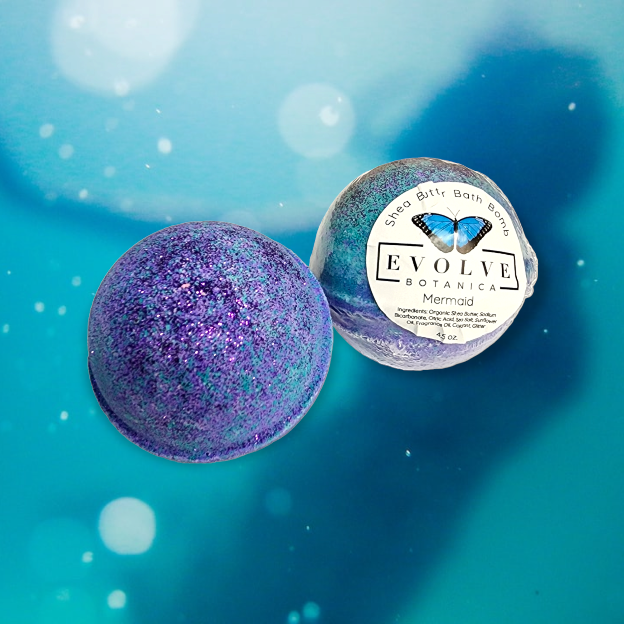 A vibrant Mermaid Bath Bomb with ocean-inspired colors and bio-glitter, perfect for a relaxing bath experience.