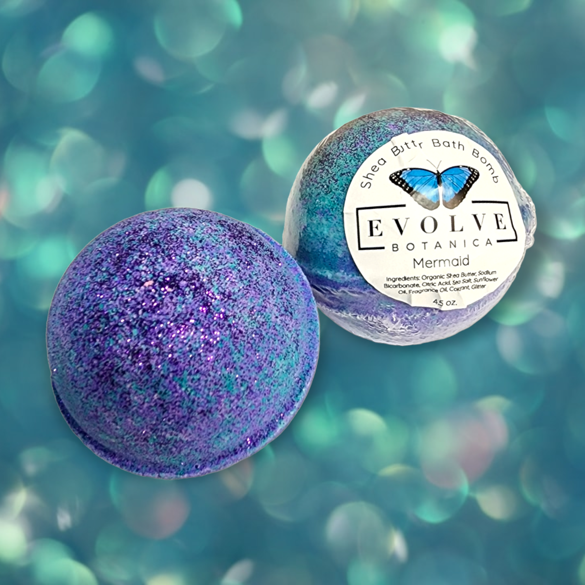 A vibrant Mermaid Bath Bomb with ocean-inspired colors and bio-glitter, perfect for a relaxing bath experience.