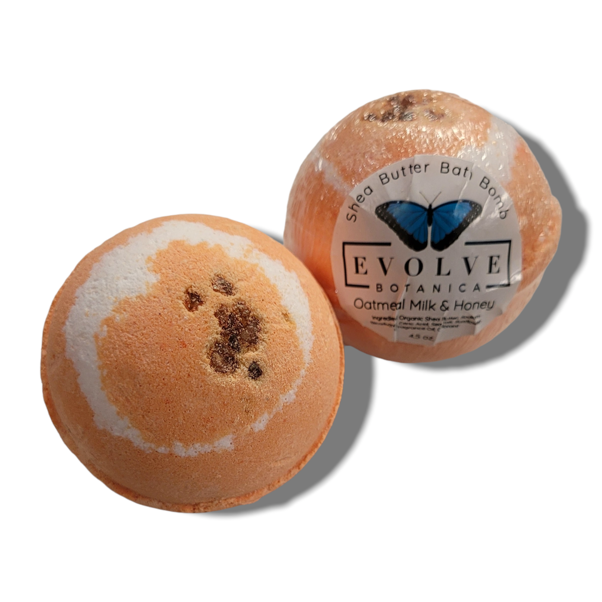 Oatmeal Milk Honey Bath Bomb with soothing ingredients for delicate skin, featuring a vibrant color and a fizzing effect in a bath setting.