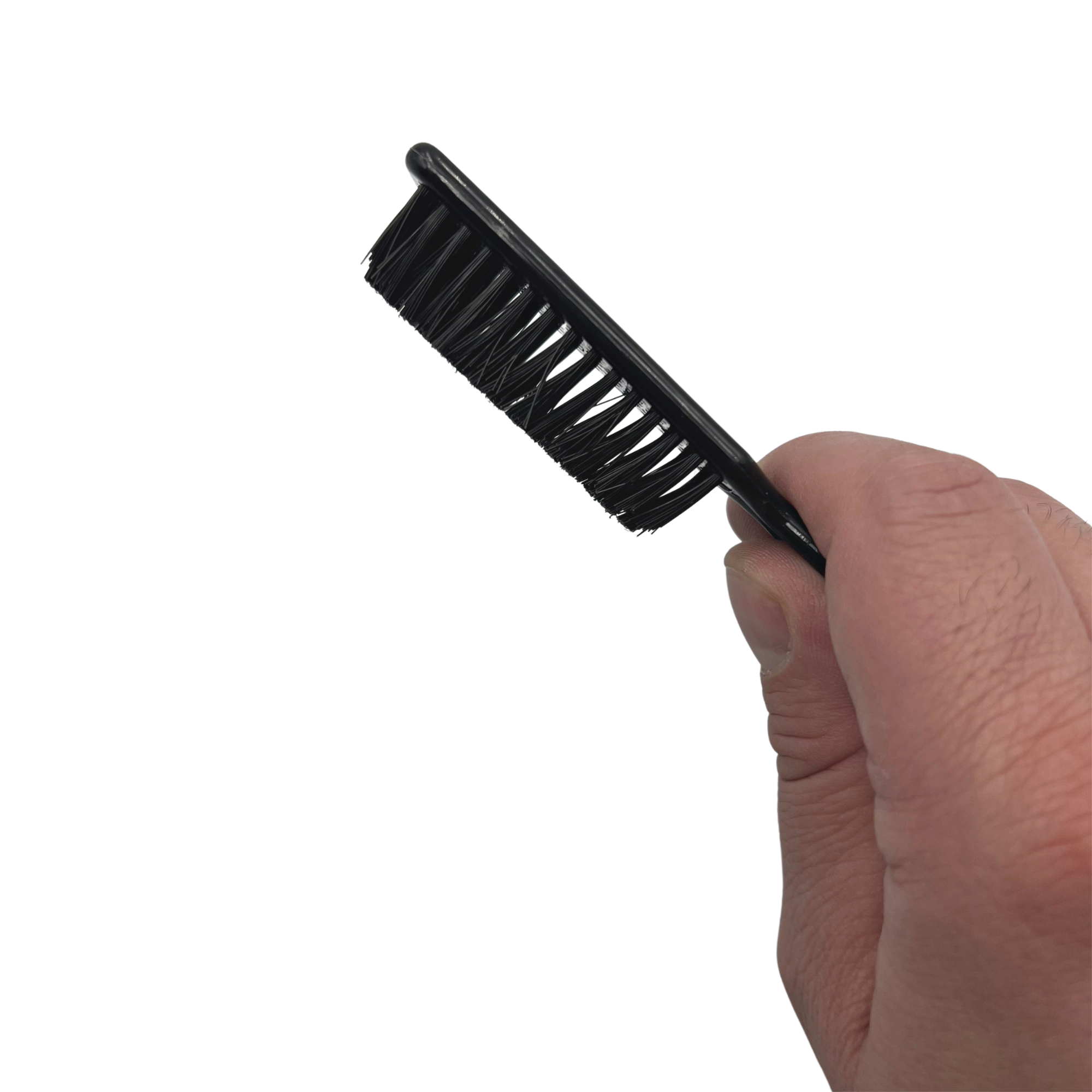 A close-up of the Beard Filler Brush showcasing its ergonomic handle and soft bristles, ideal for blending beard dye.