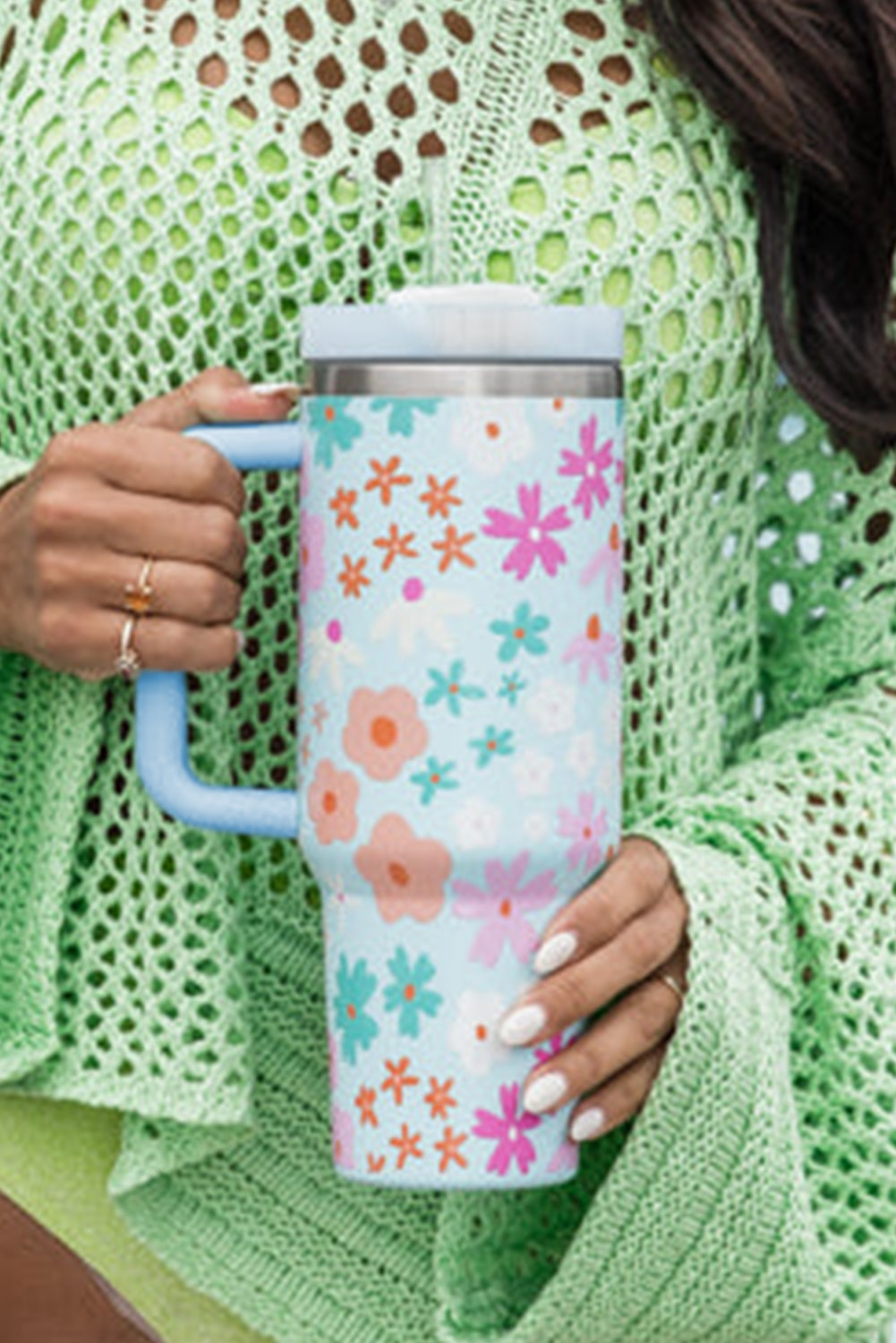 Beau Blue Cute Flower Pattern Handled Cup with Straw, featuring a vibrant floral design and a sturdy handle for easy carrying.