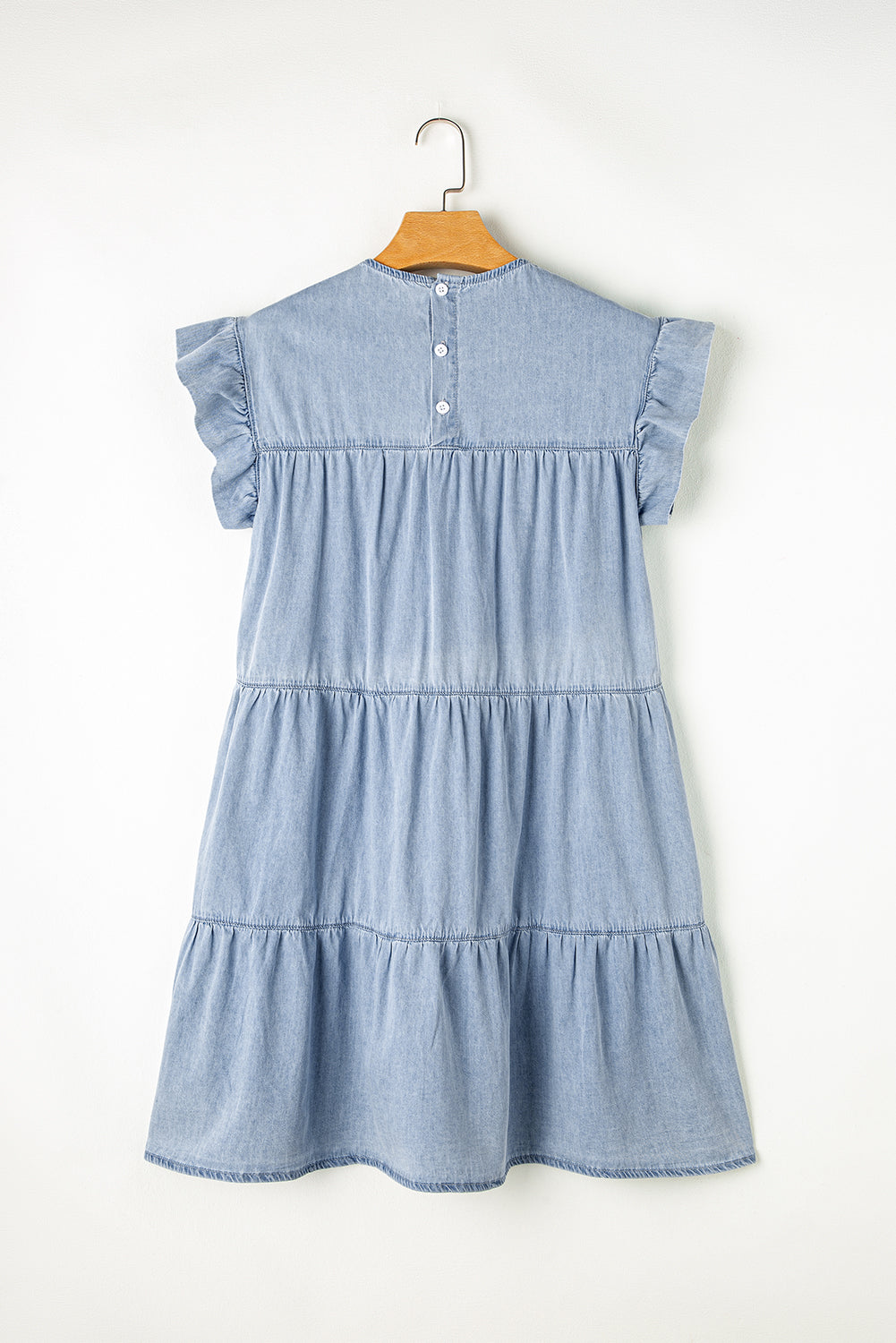 Beau Blue Ruffle Short Sleeve Tiered A-line Denim Dress displayed on a mannequin, showcasing its stylish design and ruffle sleeves.