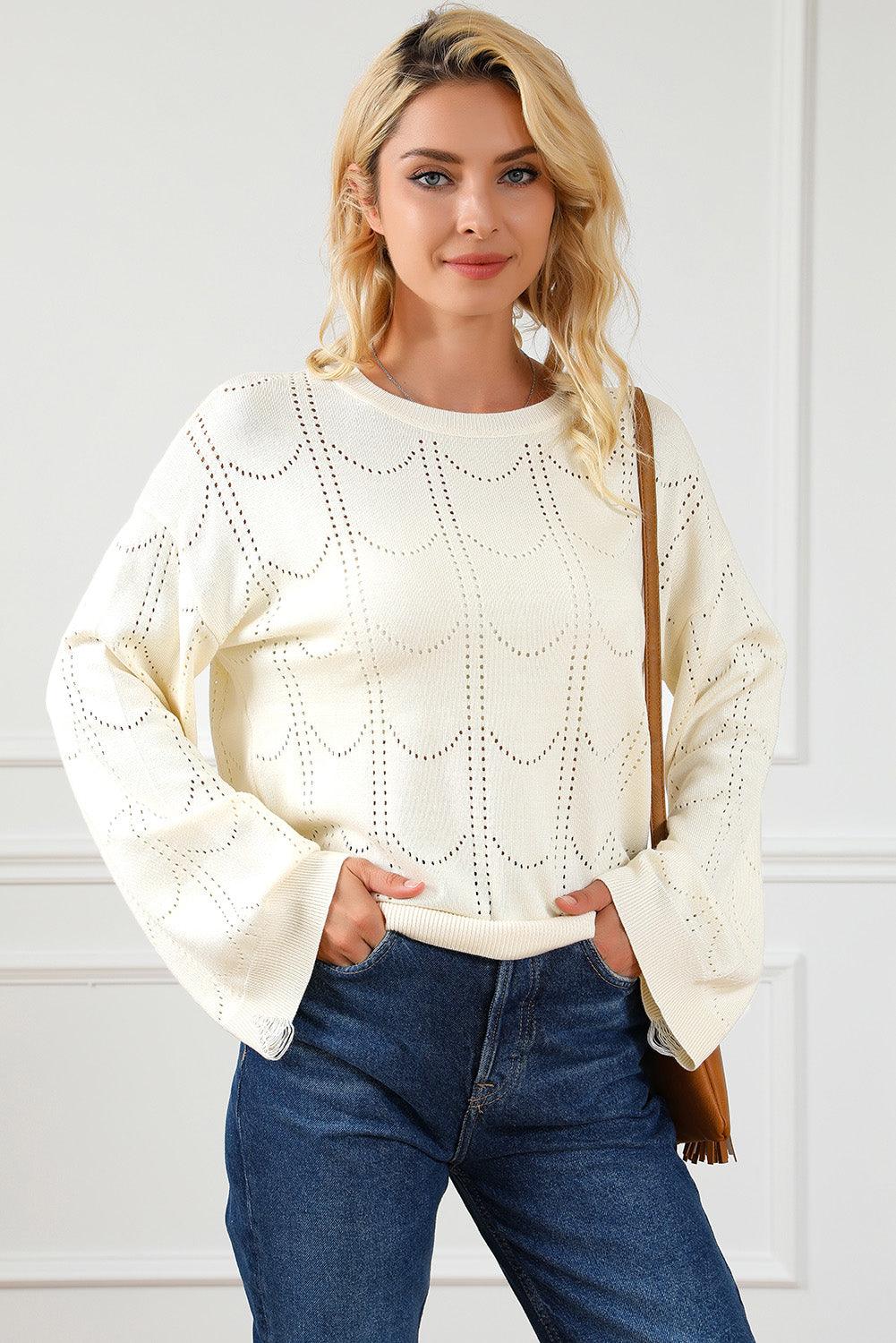 Beige Flare Sleeve Texture Knit Sweater displayed on a mannequin, showcasing its unique flare sleeves and soft knit fabric.