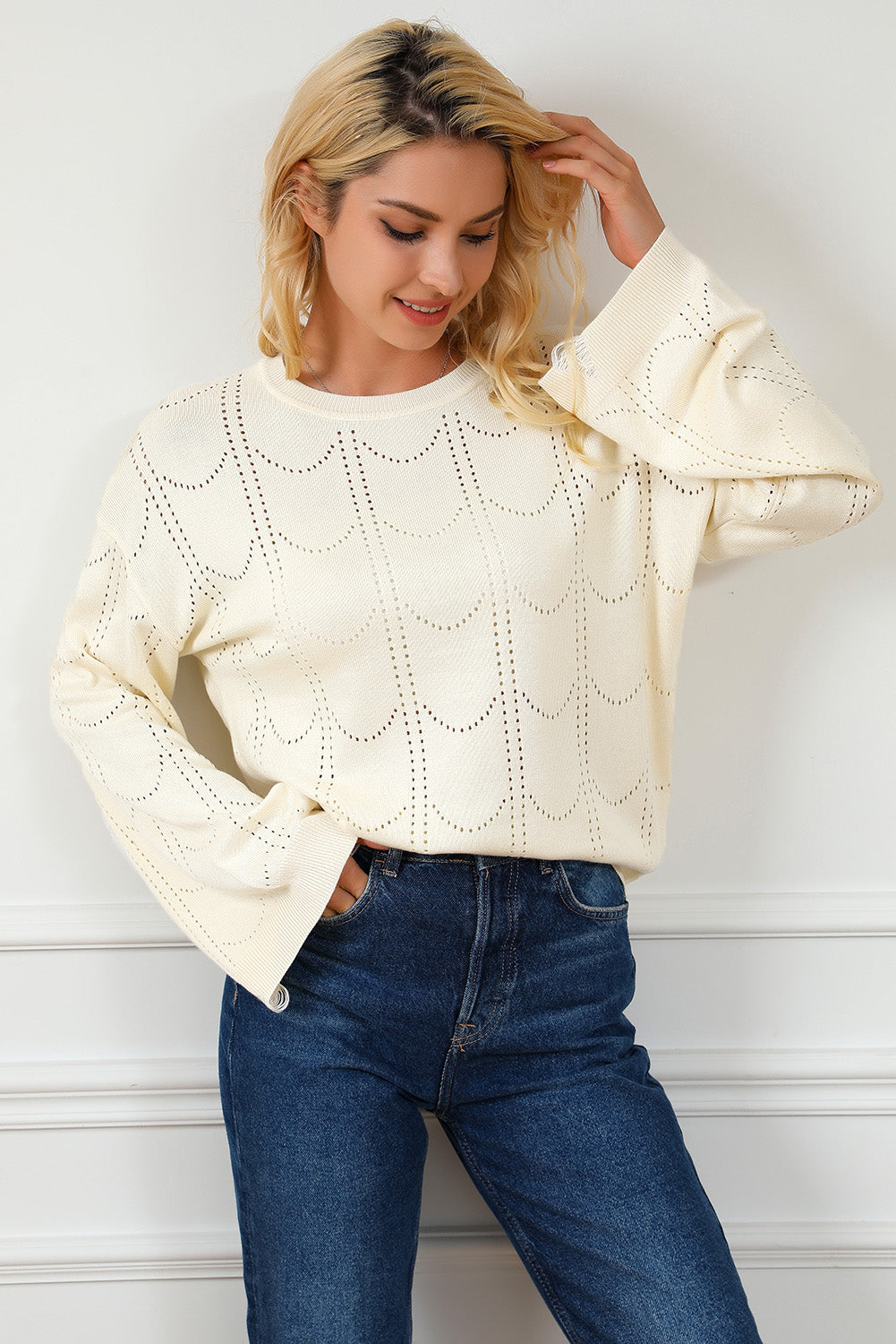 Beige Flare Sleeve Texture Knit Sweater displayed on a mannequin, showcasing its unique flare sleeves and soft knit fabric.