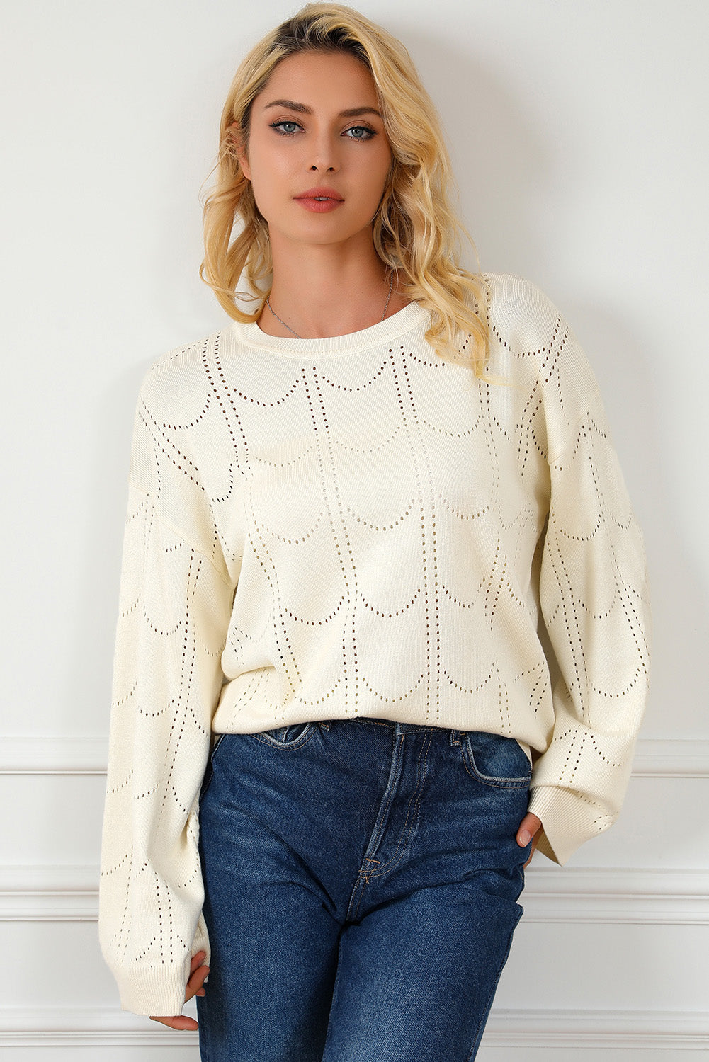 Beige Flare Sleeve Texture Knit Sweater displayed on a mannequin, showcasing its unique flare sleeves and soft knit fabric.