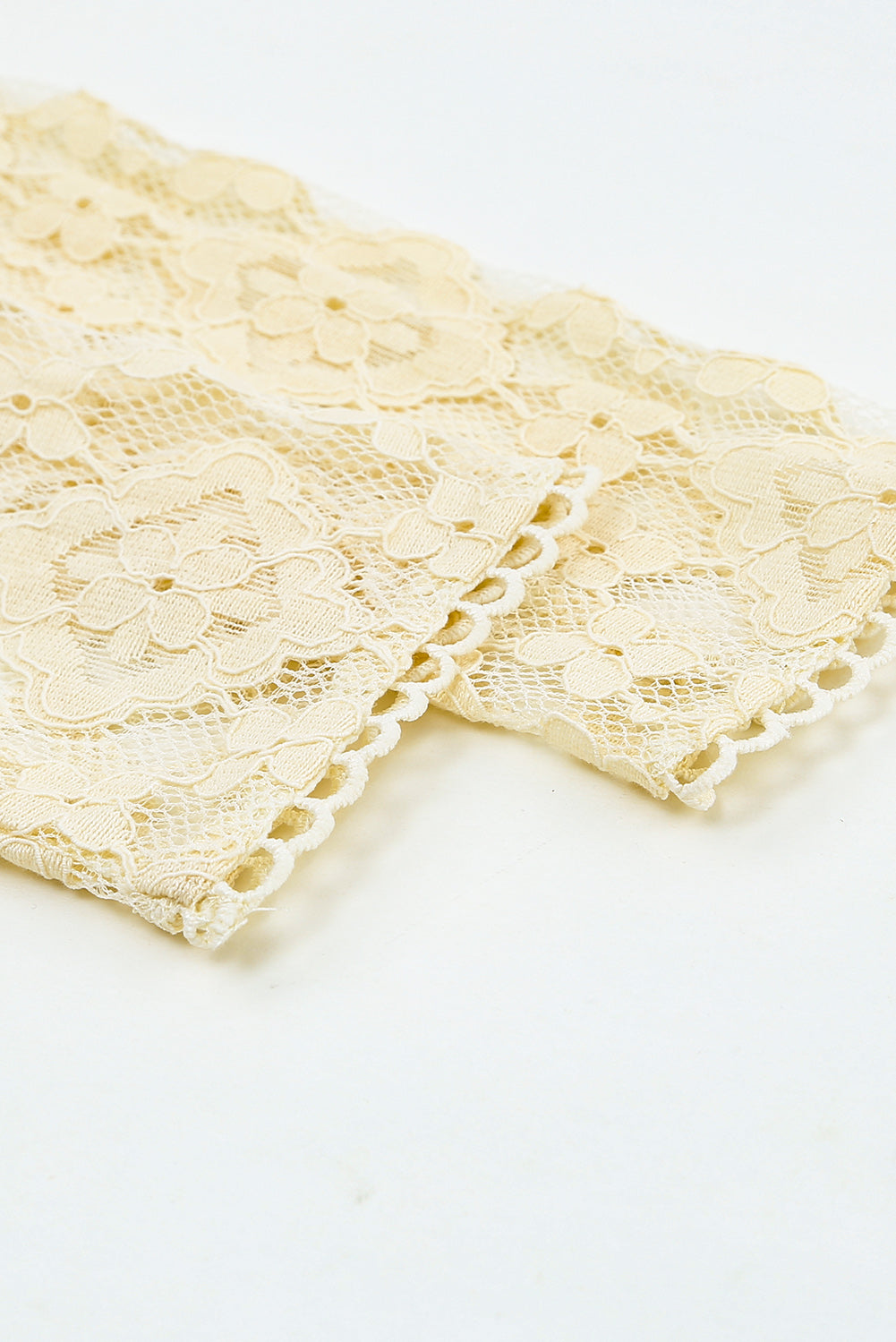 Beige Mock Neck Lace Blouse with intricate lace detailing and long sleeves, perfect for stylish layering.