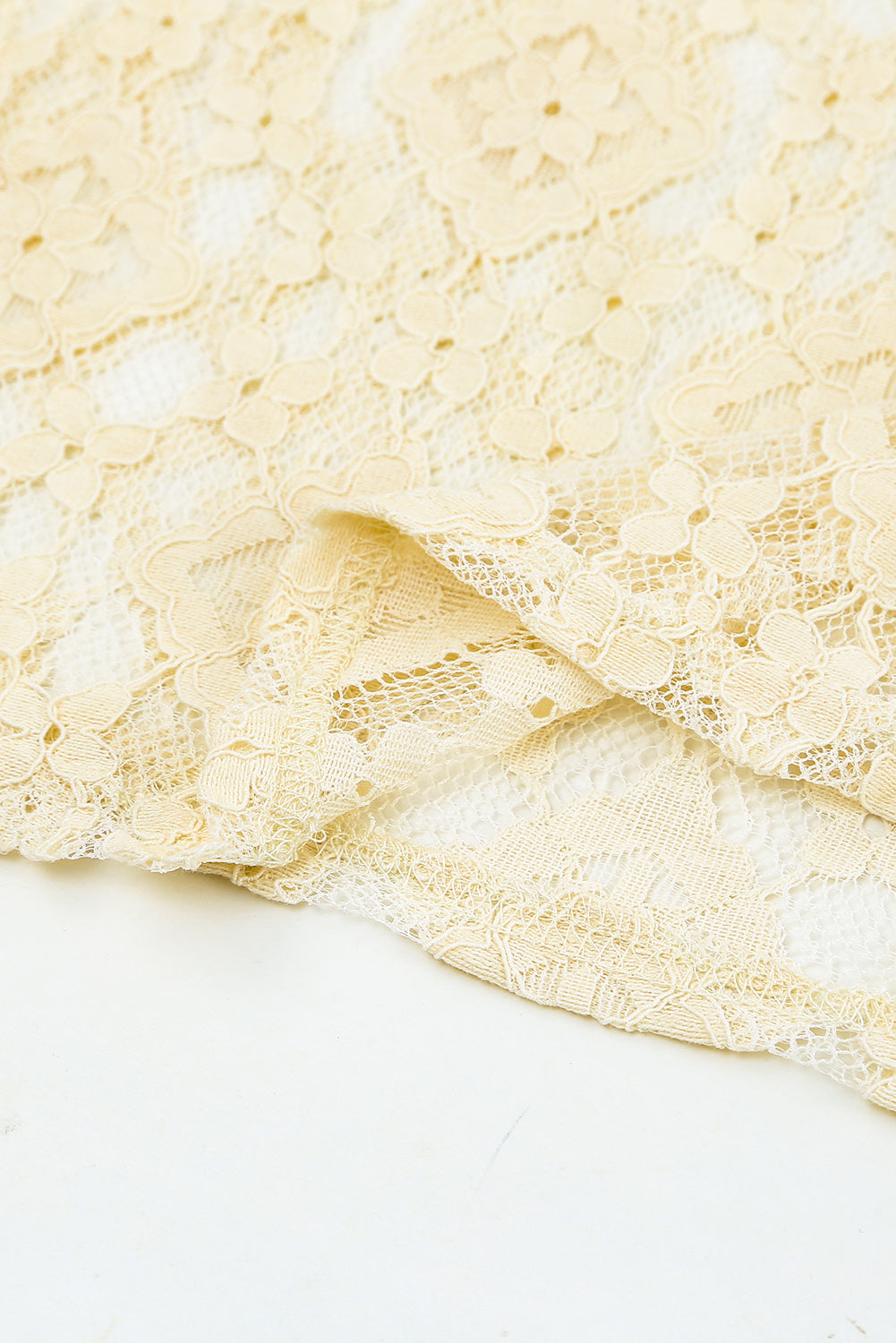 Beige Mock Neck Lace Blouse with intricate lace detailing and long sleeves, perfect for stylish layering.