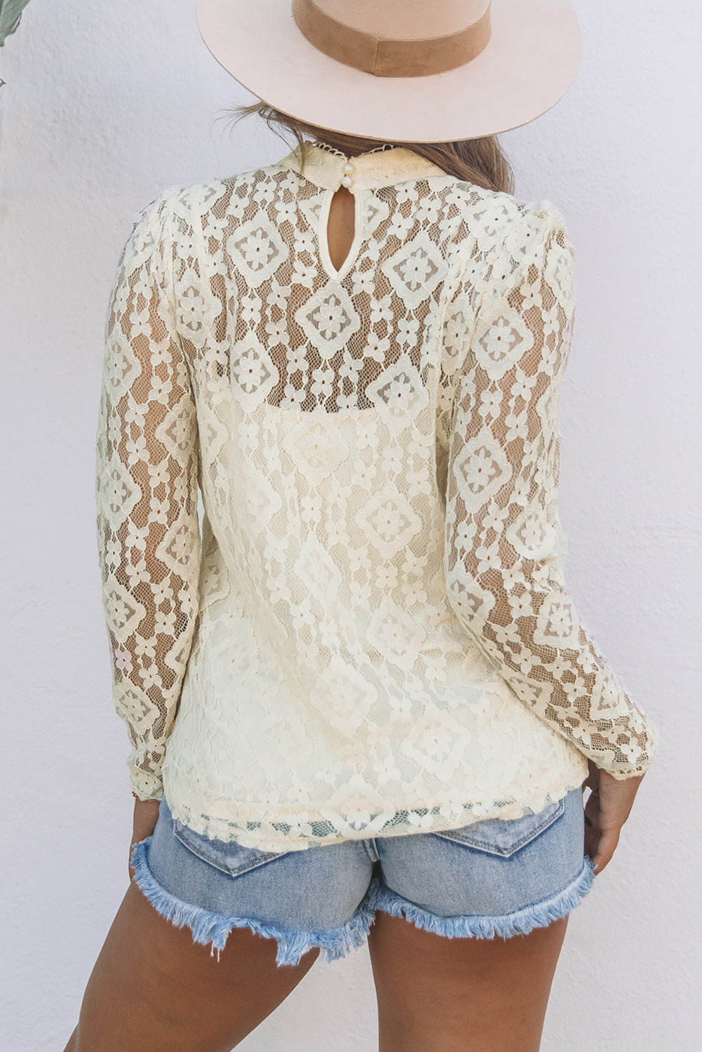 Beige Mock Neck Lace Blouse with intricate lace detailing and long sleeves, perfect for stylish layering.