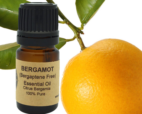 15ml bottle of Bergamot Essential Oil, bergaptene free, with a citrus aroma, featuring a label with botanical details and extraction method.