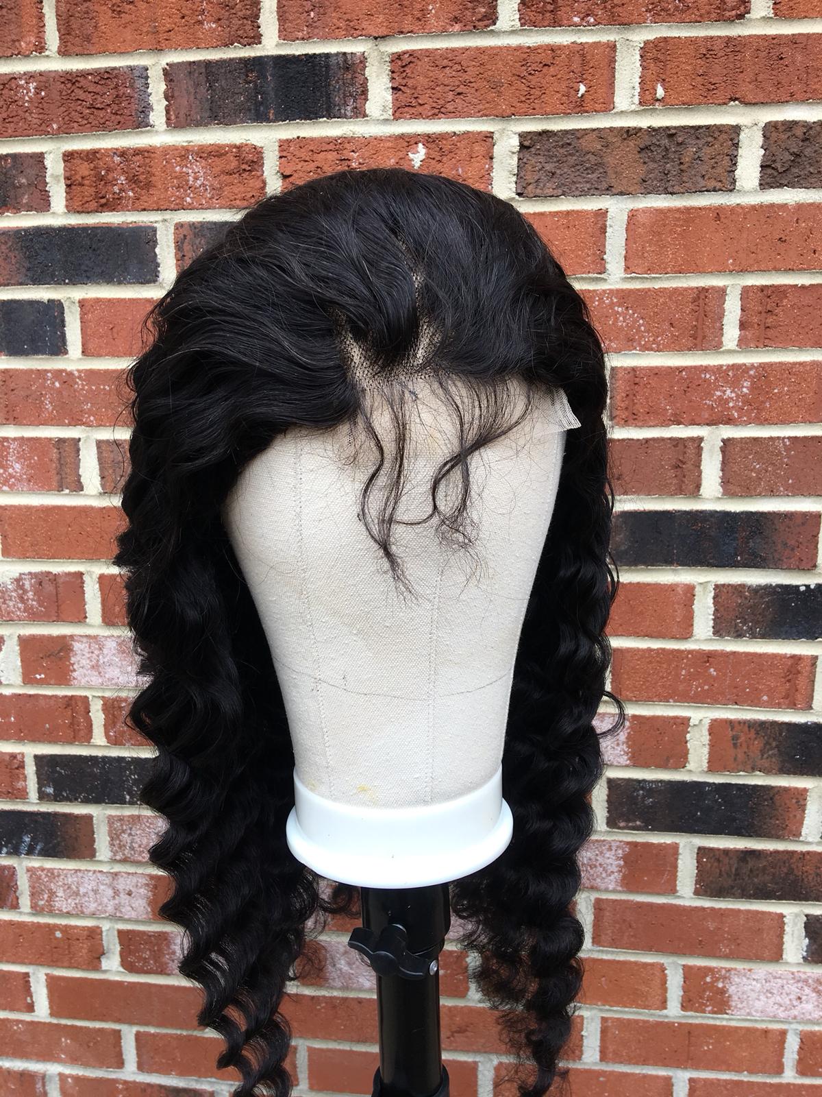 BeuMax 4x4 Loose Deep Lace Closure Human Hair Wig displayed on a mannequin, showcasing its natural look and high-quality remy hair.