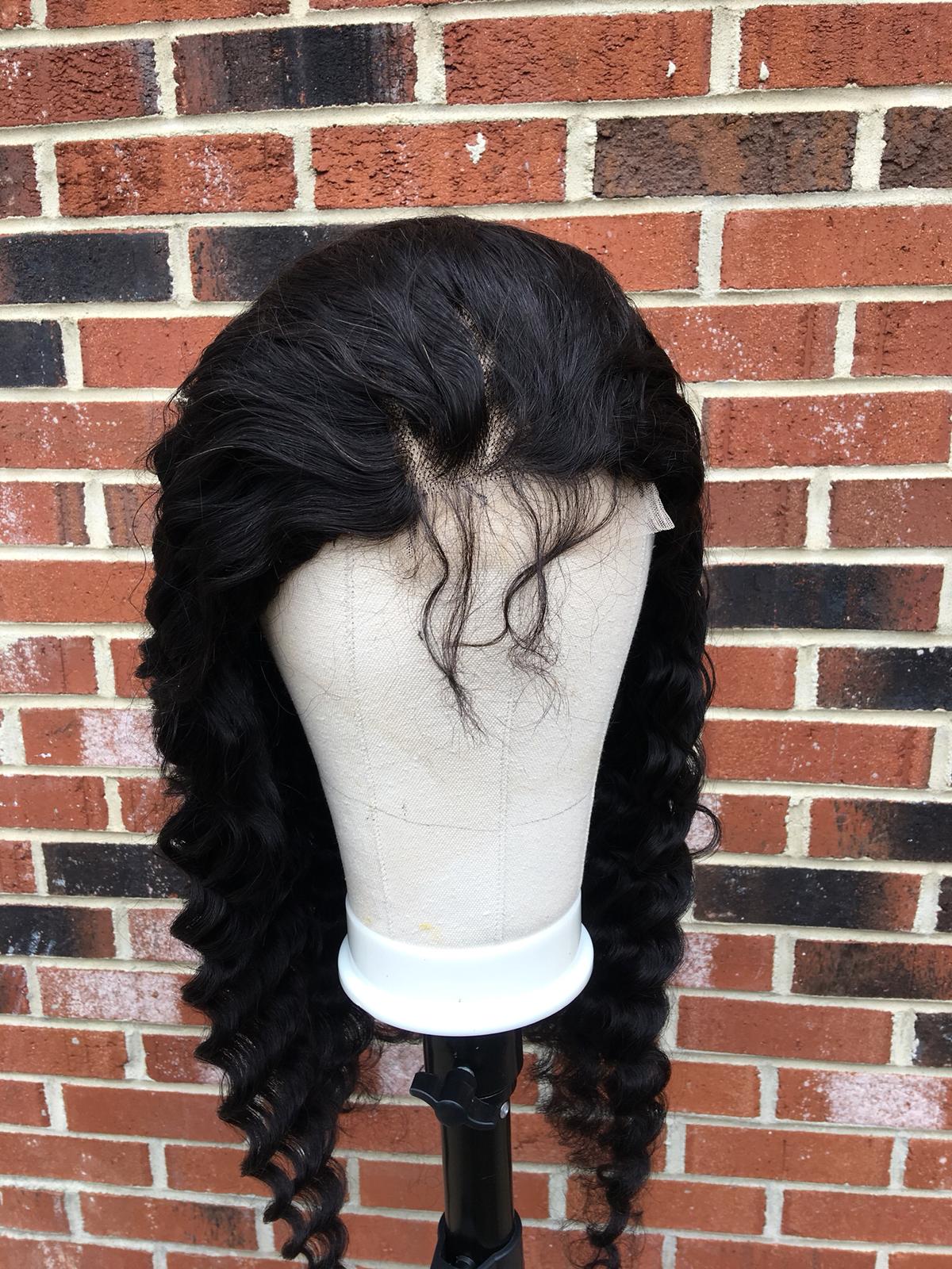 BeuMax 4x4 Loose Deep Lace Closure Human Hair Wig displayed on a mannequin, showcasing its natural look and high-quality remy hair.