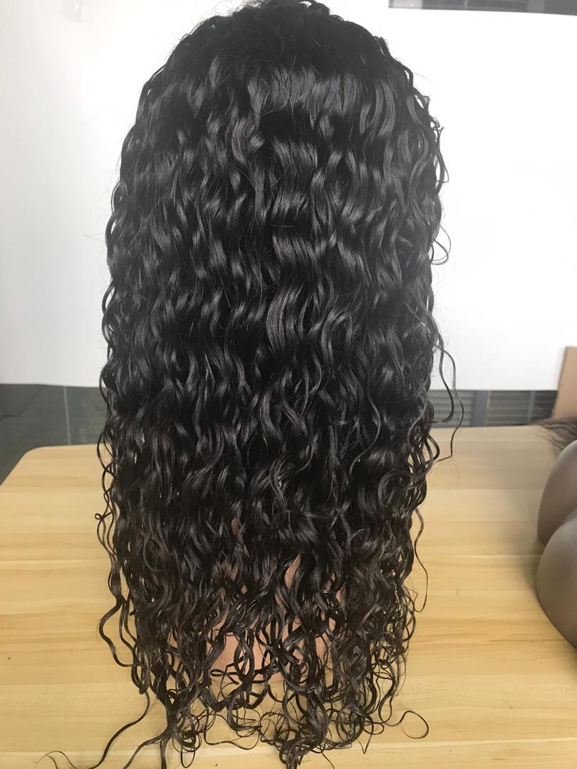 BeuMax Brazilian 13x4 Water Wave Lace Front Human Hair Wig showcasing natural waves and high-quality lace.