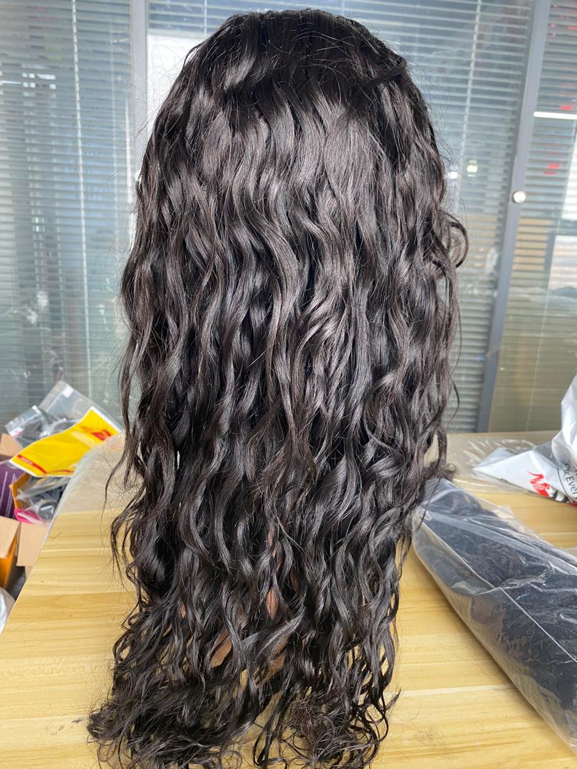 BeuMax Brazilian 13x4 Water Wave Lace Front Human Hair Wig showcasing natural waves and high-quality lace.