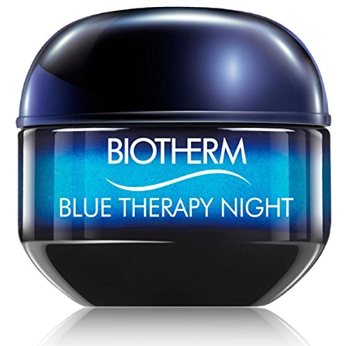 Biotherm Blue Therapy Night Cream jar with a blue lid, showcasing its luxurious texture and packaging.