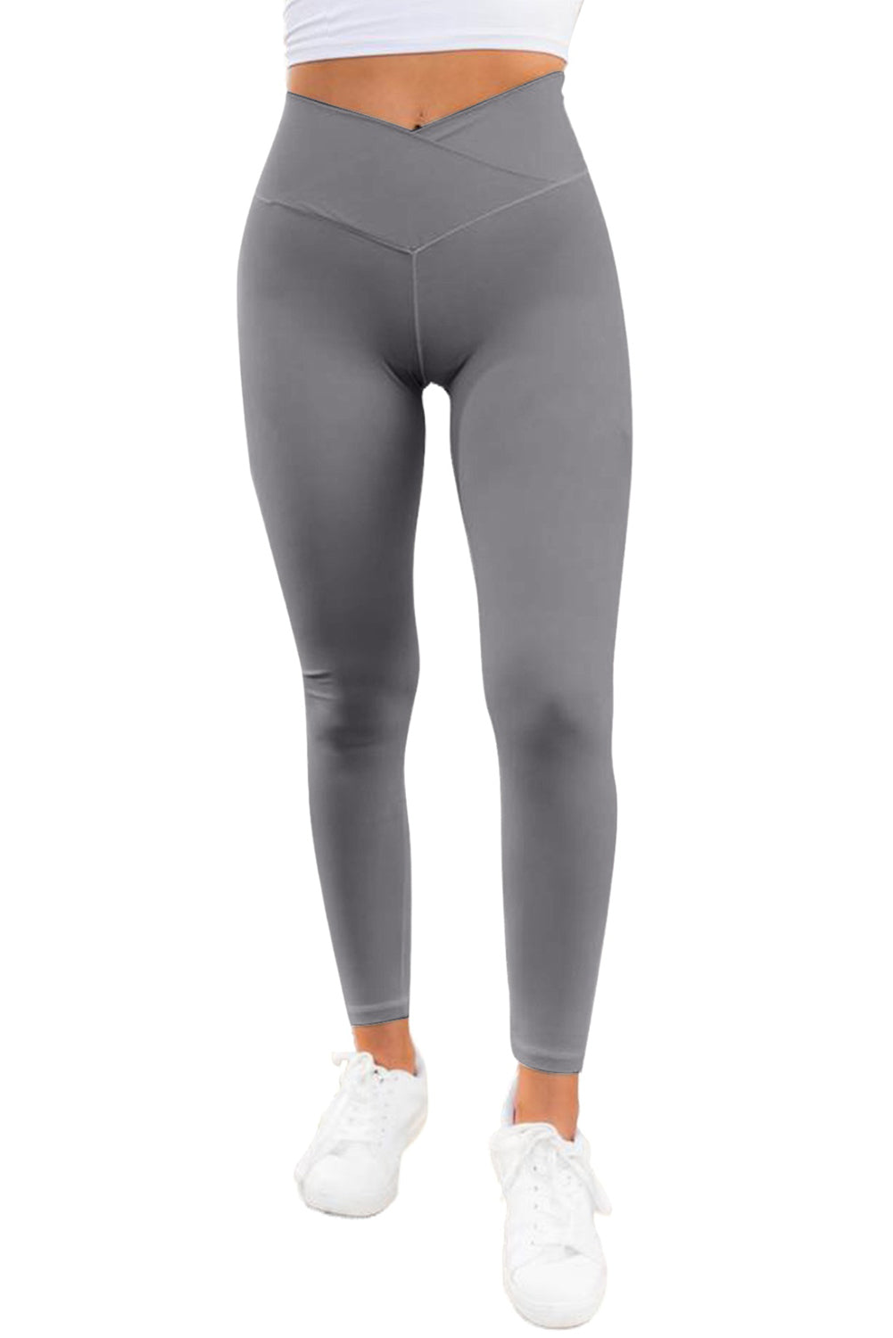 Black Arch Waist Sports Yoga Leggings featuring a high waist and crossed front design, perfect for workouts and casual wear.