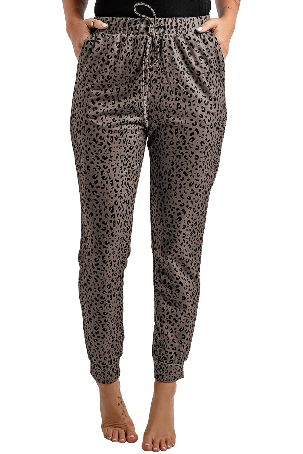 Black Breezy Leopard Joggers featuring a stylish leopard print and adjustable smocked waist, perfect for casual wear.