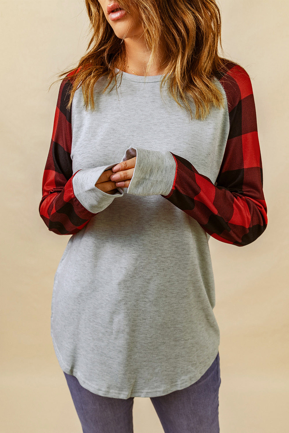 Black Buffalo Plaid Long Sleeve Sweatshirt featuring a cozy cotton blend fabric and stylish patchwork design.