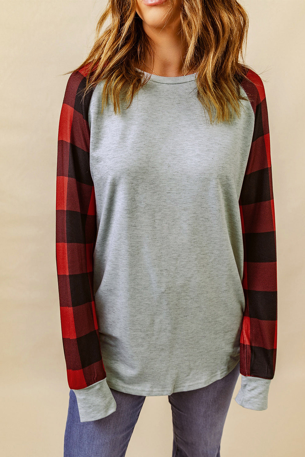 Black Buffalo Plaid Long Sleeve Sweatshirt featuring a cozy cotton blend fabric and stylish patchwork design.