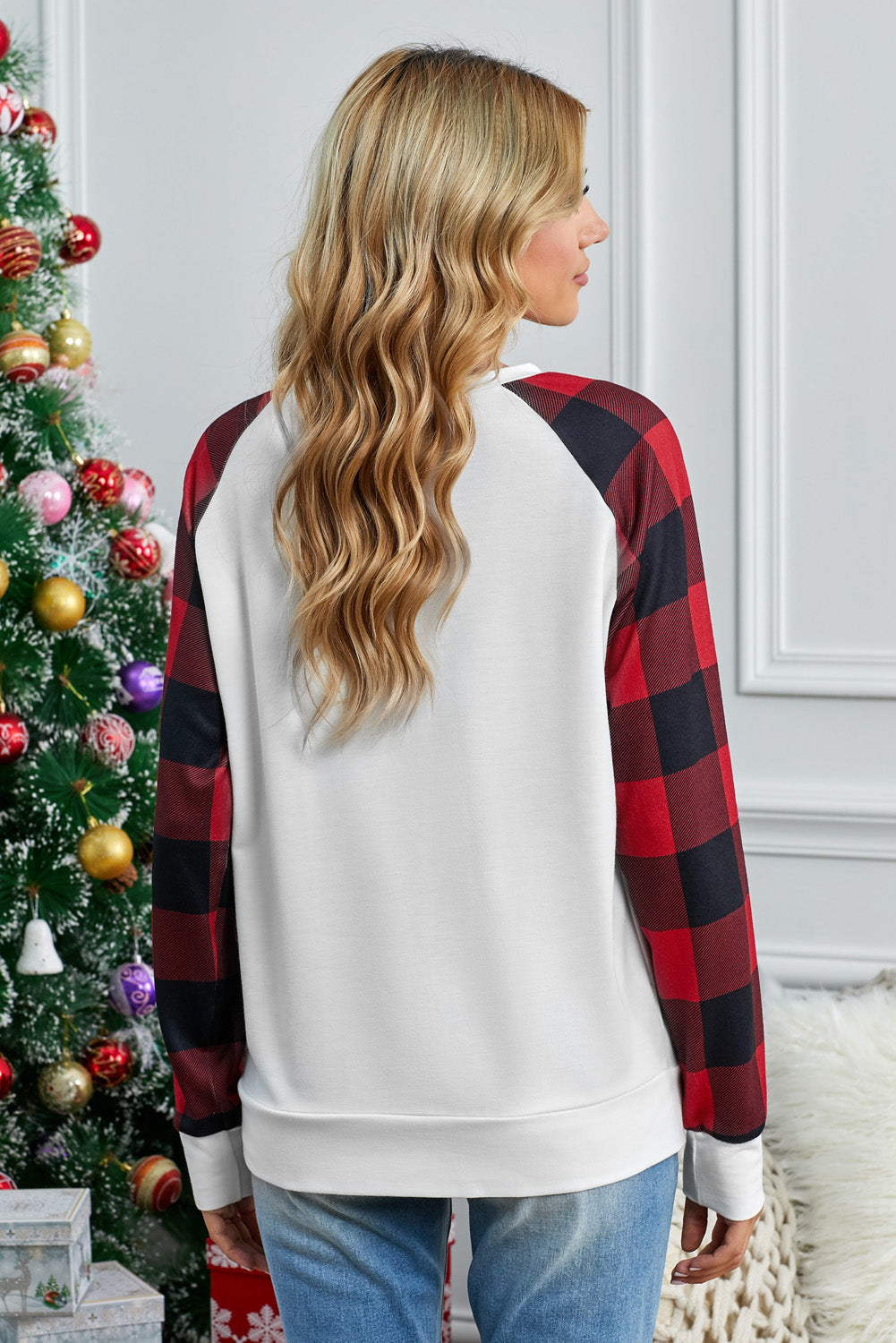 Black Buffalo Plaid Long Sleeve Sweatshirt featuring a cozy cotton blend fabric and stylish patchwork design.