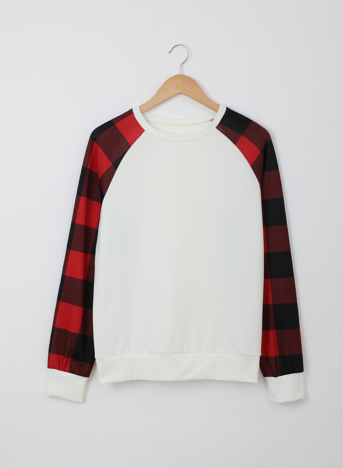 Black Buffalo Plaid Long Sleeve Sweatshirt featuring a cozy cotton blend fabric and stylish patchwork design.